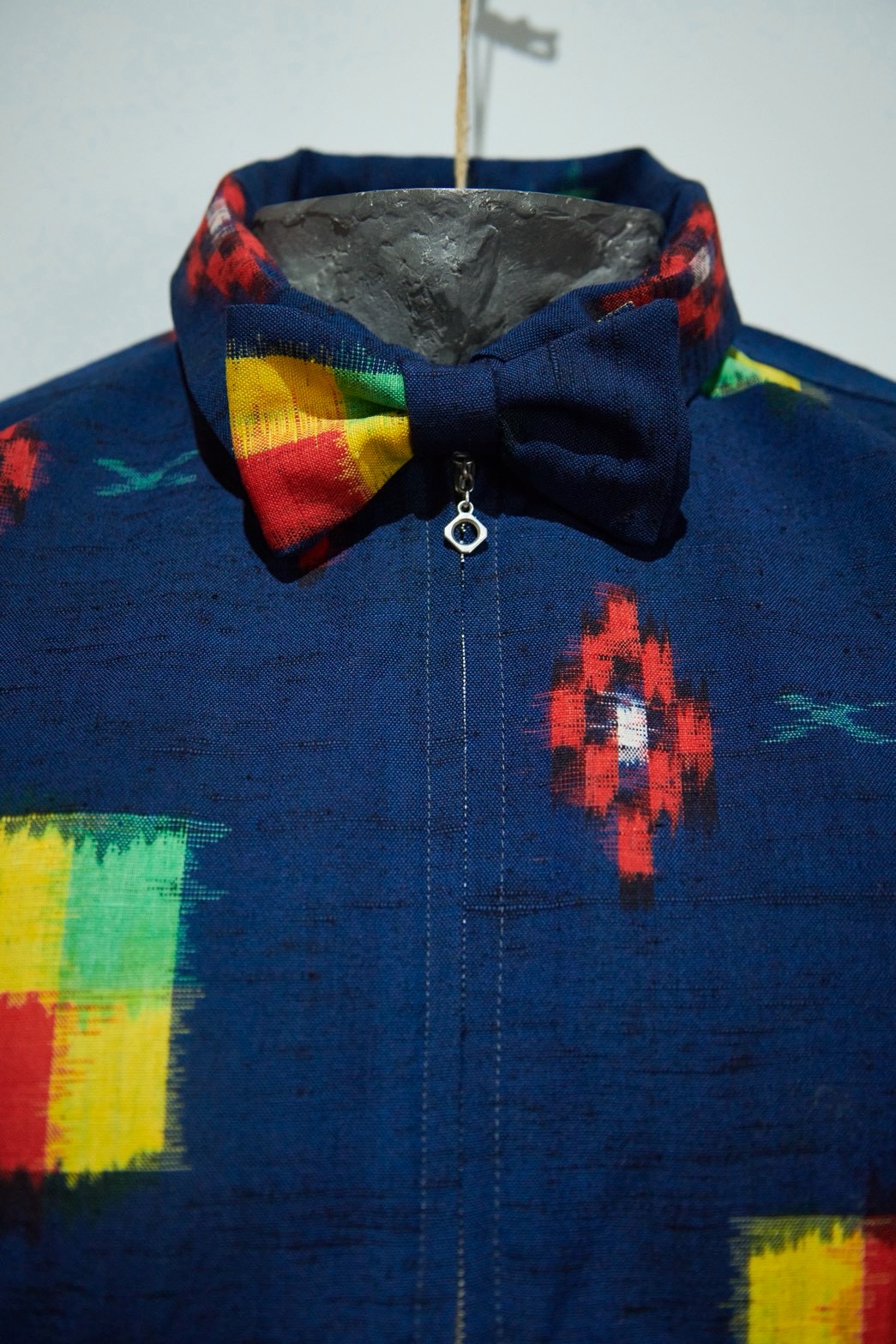 Indigo kasuri shirt jacket with a bow tie