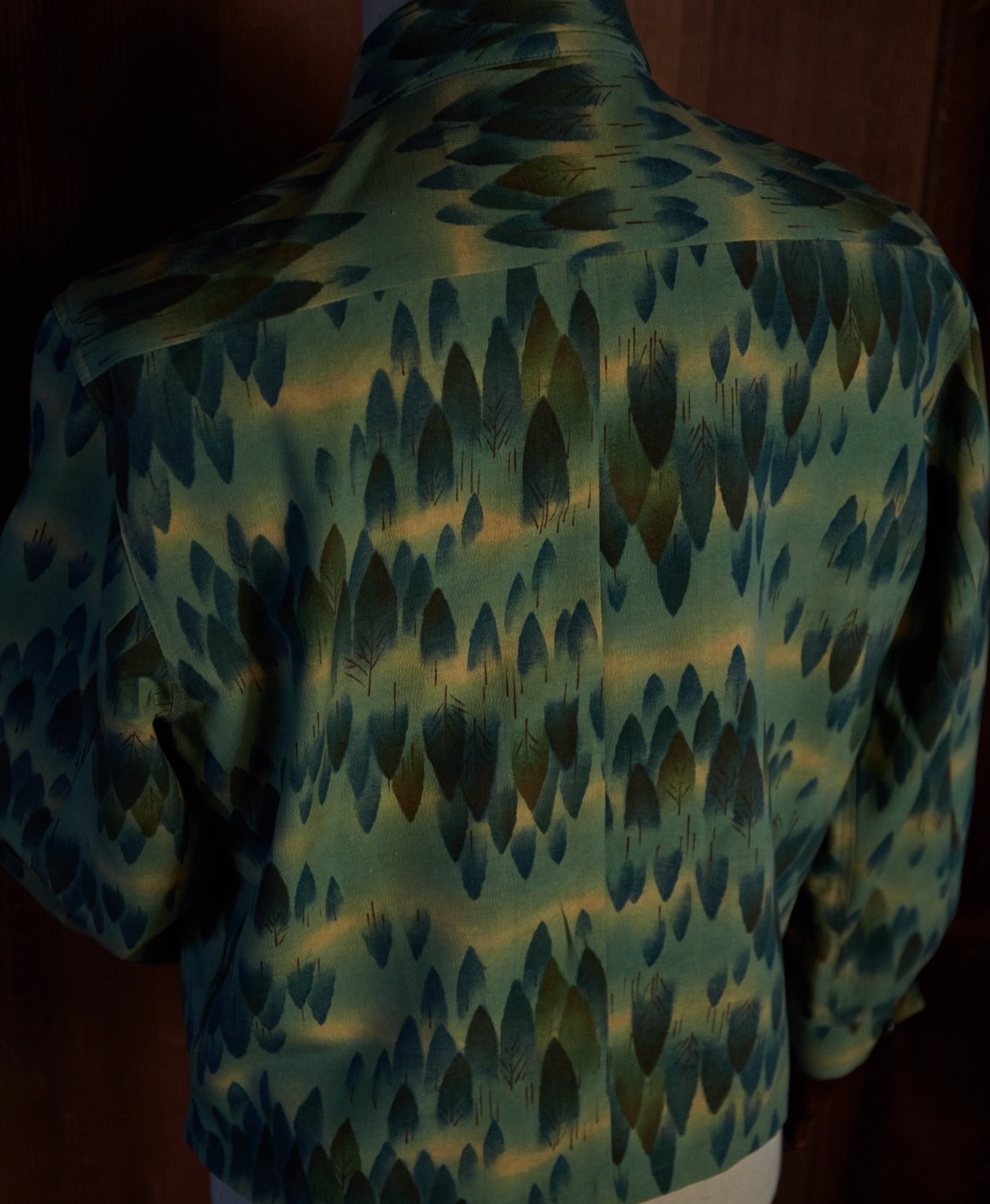 Forest-green shirt jacket, back view